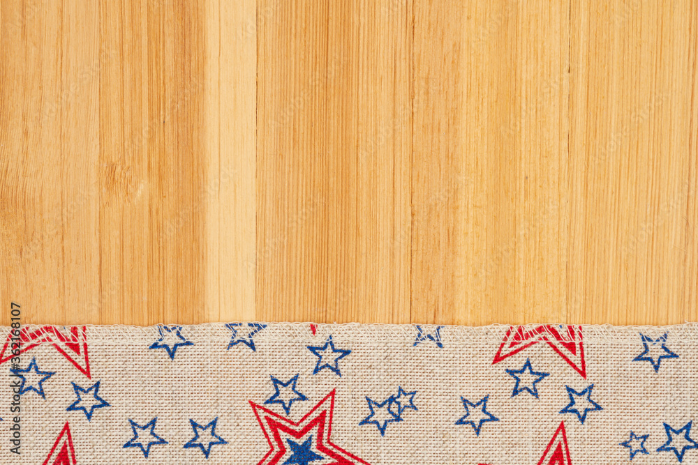 American background with retro USA stars and stripes burlap ribbon on wood American background with retro USA stars and stripes burlap ribbon on wood