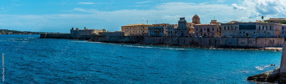 A panorama along the shoreline of Ortygia island in Syracuse, Sicily in summer