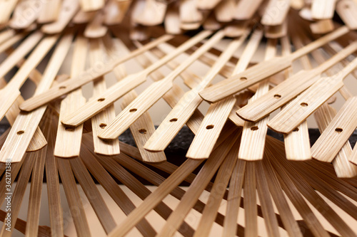 close-up parts of wooden hand fan