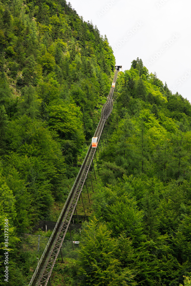 Fototapeta premium A cable car taking visitors up to Salzwelten; one of the oldest salt mines in the world. The salt mine is located in Hallstatt, Austria.