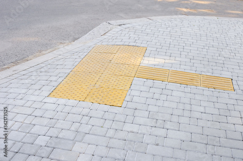 Special tracks for the blind and visually impaired. Tactile coating. Tactile Paving, Braille Blocks, Tactile Tiles, Visually Impaired Tiles, Tenji Blocks photo