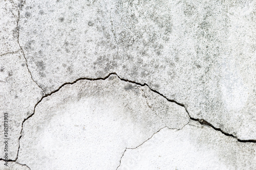 Crack on old cement wall texture background, outdoor day light