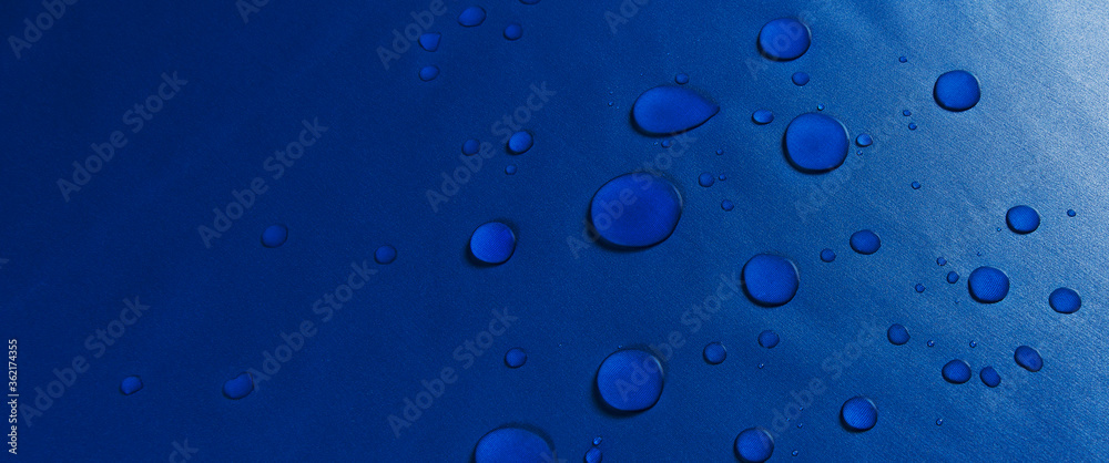 drops of water on a fabric surface. macro.