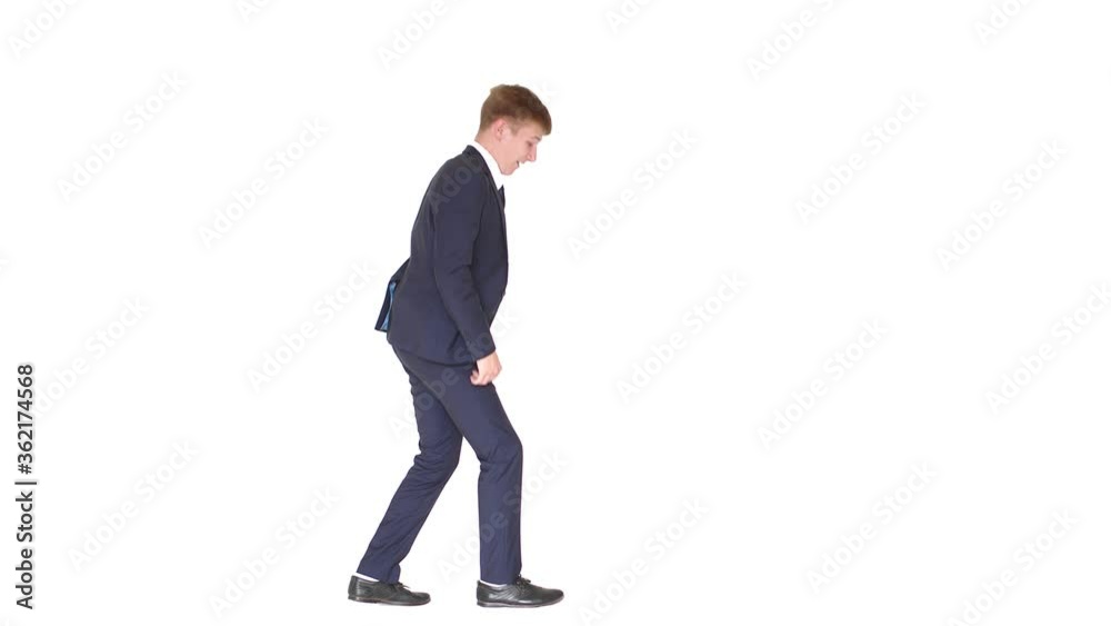 Joyful, happy young man in a beautiful suit, celebrates success, great news, feels strong. The office employee is actively dancing and waving his arms. Slow motion. 4k Joyful, happy young man in a beautiful suit, celebrates success, great news, feels strong. The office employee is actively dancing and waving his arms. Slow motion. 4k