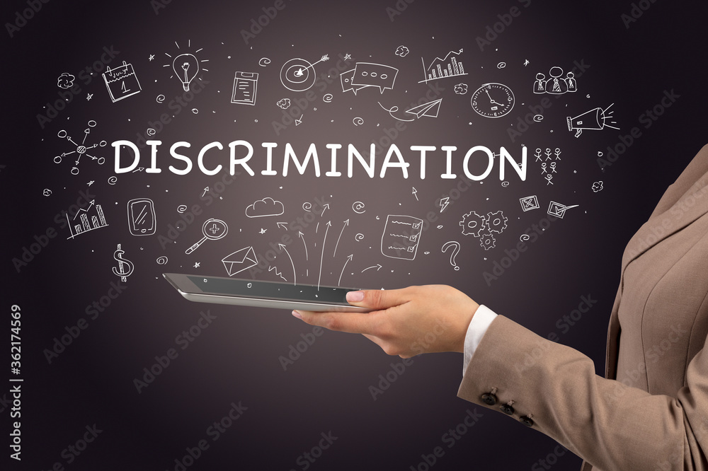 Close-up of a touchscreen with DISCRIMINATION inscription, social media concept Close-up of a touchscreen with DISCRIMINATION inscription, social media concept