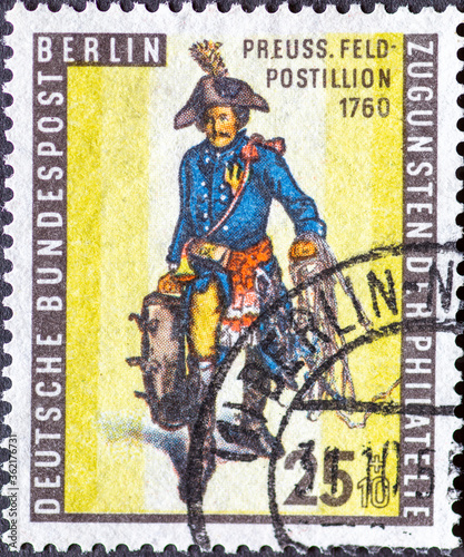 GERMANY, Berlin - CIRCA 1955: a postage stamp from Germany, Berlin showing Prussian field postillon. Day of the 1955 postal stamp photo