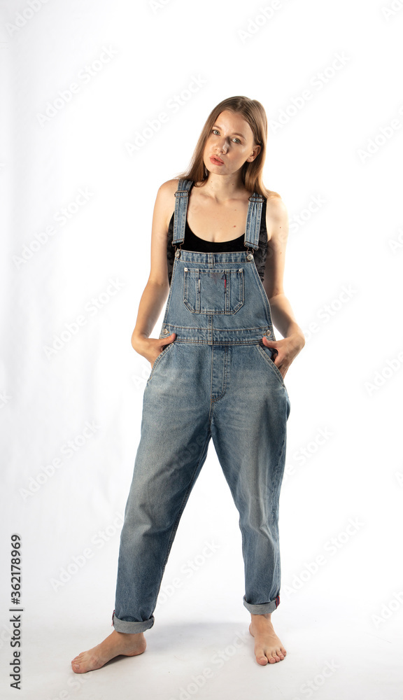 young girl in denim overalls, studio shooting
young girl in denim overalls, studio shooting