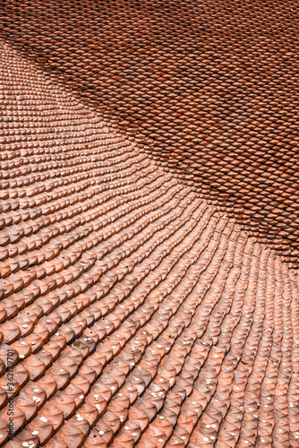 Obraz na płótnie red roof tiles in a symmetrical pattern w salonie