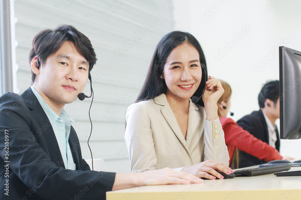 Powerful and Successful of Business people Call Center and technical Support staff. Smiling Receptionist phone operators teamwork. Asian customer support team. Powerful and Successful of Business people Call Center and technical Support staff. Smiling Receptionist phone operators teamwork. Asian customer support team.