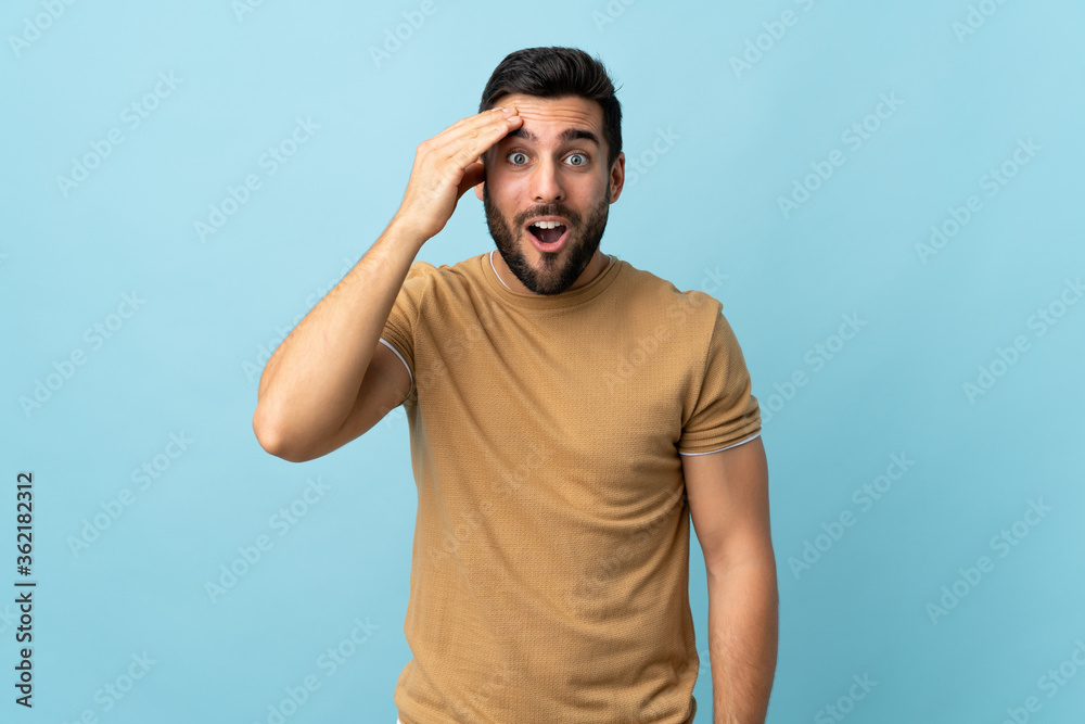 Young handsome man with beard over isolated background has realized something and intending the solution Young handsome man with beard over isolated background has realized something and intending the solution