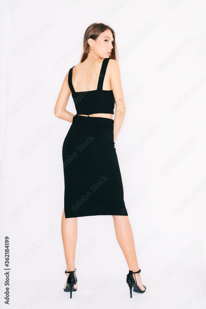 young woman in a dress, isolated on white. young woman in a dress, isolated on white.