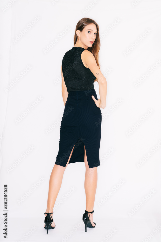 young woman in a dress, isolated on white. young woman in a dress, isolated on white.