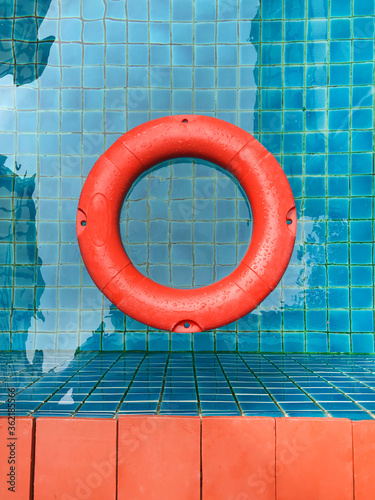 color lifebuoy in a blue pool, beautiful visual