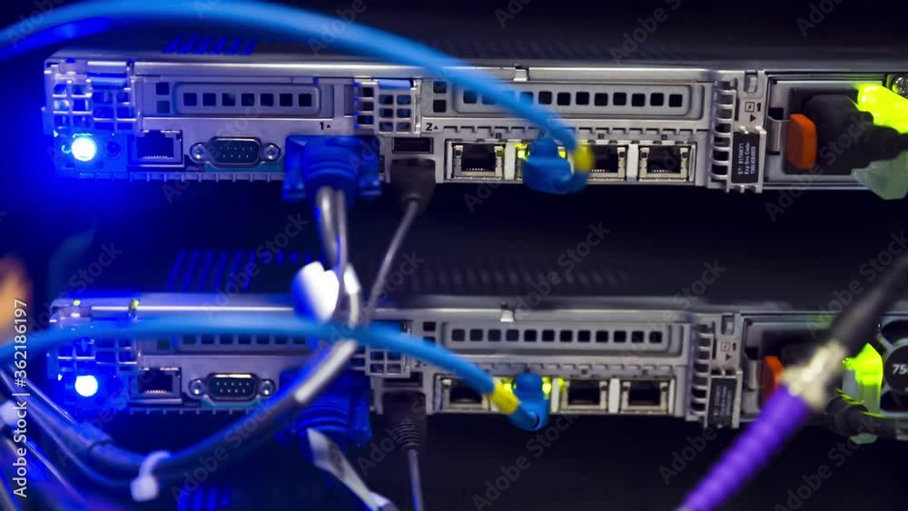 Back Side Of Modern Working Data Center Servers With Cables - Cloud Service And E-Commerce, Upload And Download Server With Cables And Flashing LED Lights Back Side Of Modern Working Data Center Servers With Cables - Cloud Service And E-Commerce, Upload And Download Server With Cables And Flashing LED Lights