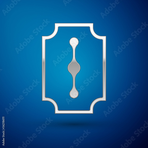 Silver Blade razor icon isolated on blue background.  Vector Illustration