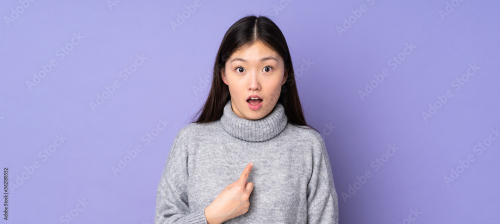 Young asian woman over isolated background pointing to oneself - obrazy, fototapety, plakaty 