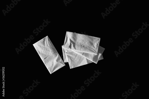 Paper handkerchiefs of a black background