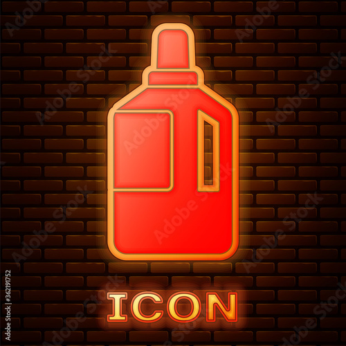 Glowing neon Fabric softener icon isolated on brick wall background. Liquid laundry detergent, conditioner, cleaning agent, bleach.  Vector Illustration