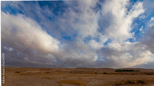 Wide panorama of morning clouds over Negev desert