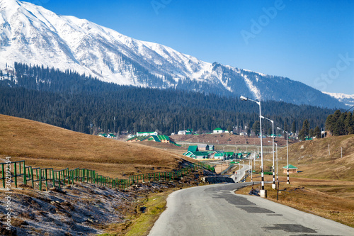 A road leading to Himalayan Mountains through Gulmarg