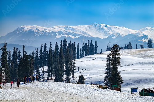 Tourist preparing for Skiing on Snow Covered Himalayan Mountains