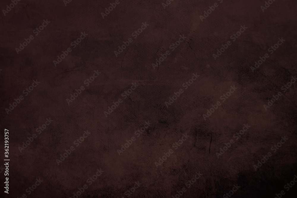 Brown grungy canvas background or texture with dark vignette borders