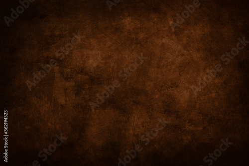 dark brown stained grungy background or texture