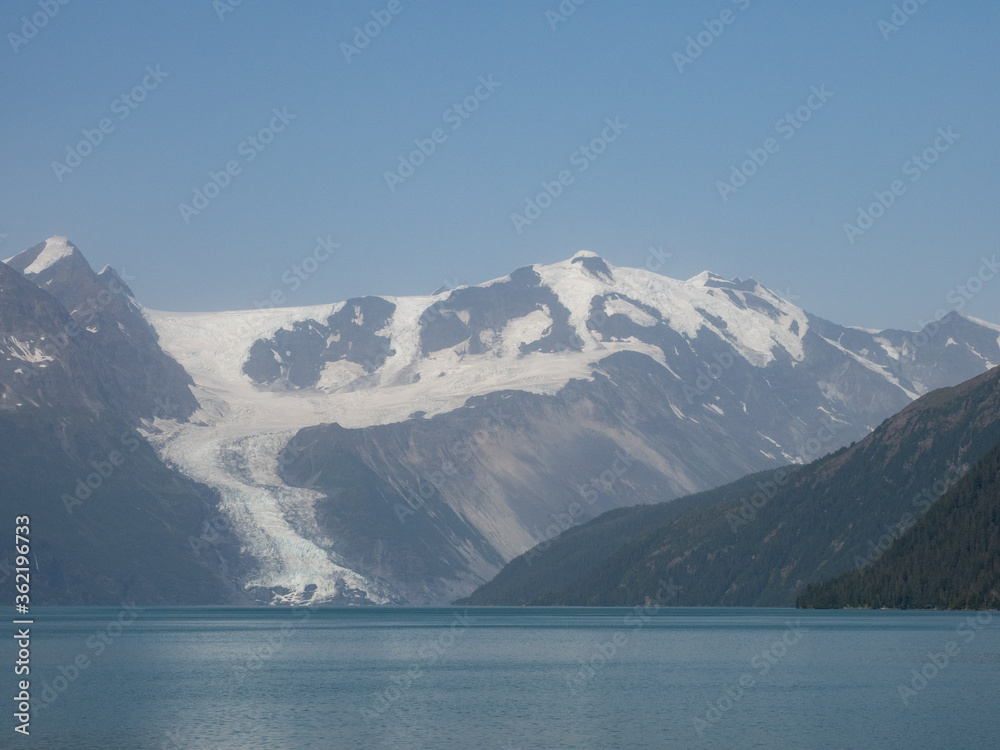 Glacier and mountain range view from cruise ship. Prince William Sound, Alaska, USA.