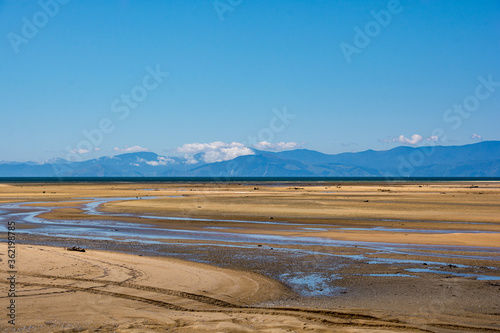View of the coast of the Abel Tasman National Park  New Zealand on a sunny summer day