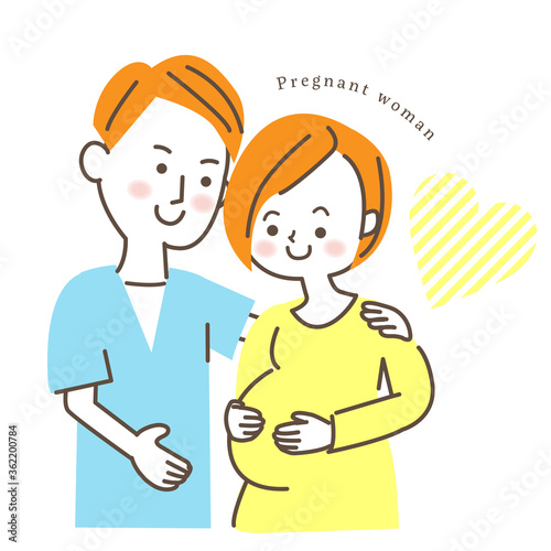 笑顔の妊婦さんと寄り添う旦那さん