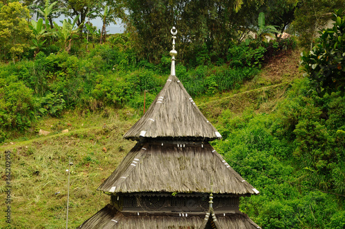 WEST SUMATERA, INDONESIA -JUNE 8, 2014: Tuo Kayu Jao Mosque is located in West Sumatra, Indonesia. Built in 1599 and is the second oldest mosque in Indonesia. photo