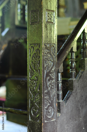 WEST SUMATERA, INDONESIA -JUNE 8, 2014: Architectural detail and woodcraft at Tuo Kayu Jao Mosque in West Sumatra, Indonesia. Built-in 1599 and is the second oldest mosque in Indonesia. photo