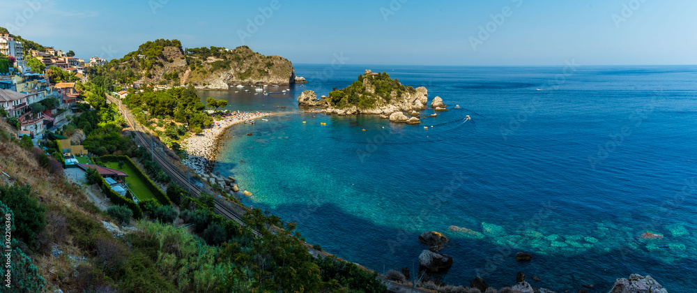 A view of the shoreline and Isola Bella near Taormina, Sicily in summer