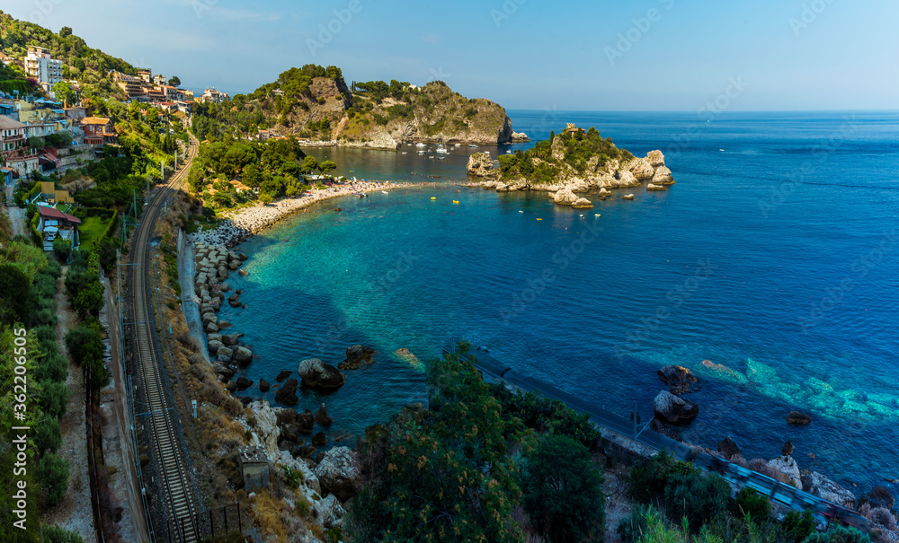 A close-up view of the shoreline and Isola Bella near Taormina, Sicily in summer