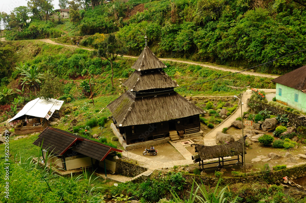 WEST SUMATERA, INDONESIA -JUNE 8, 2014: Tuo Kayu Jao Mosque is located in West Sumatra, Indonesia. Built in 1599 and is the second oldest mosque in Indonesia. WEST SUMATERA, INDONESIA -JUNE 8, 2014: Tuo Kayu Jao Mosque is located in West Sumatra, Indonesia. Built in 1599 and is the second oldest mosque in Indonesia.