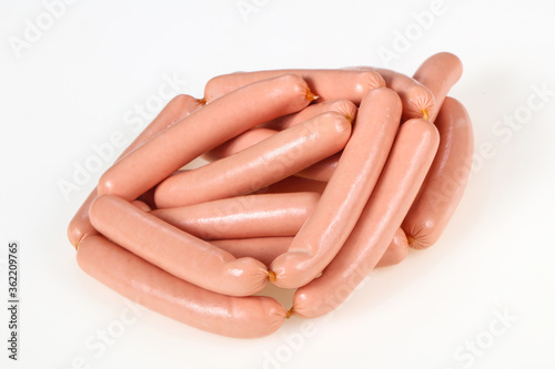 Tasty meat sausages over white background