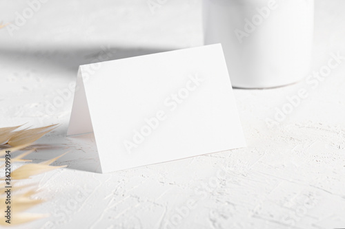 Luxury Mockup template with dry plants flower and perfume and design element design for wedding rsvp, thank you card, greeting or place card