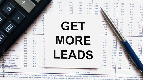 Work smarter text Get more Leads on white sheet with pen, calculator and tables