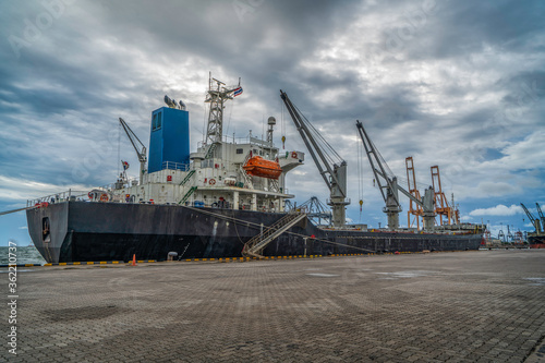 cargo ship in port © niphon