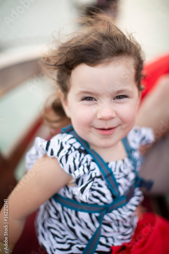 Cute little girl on a boat