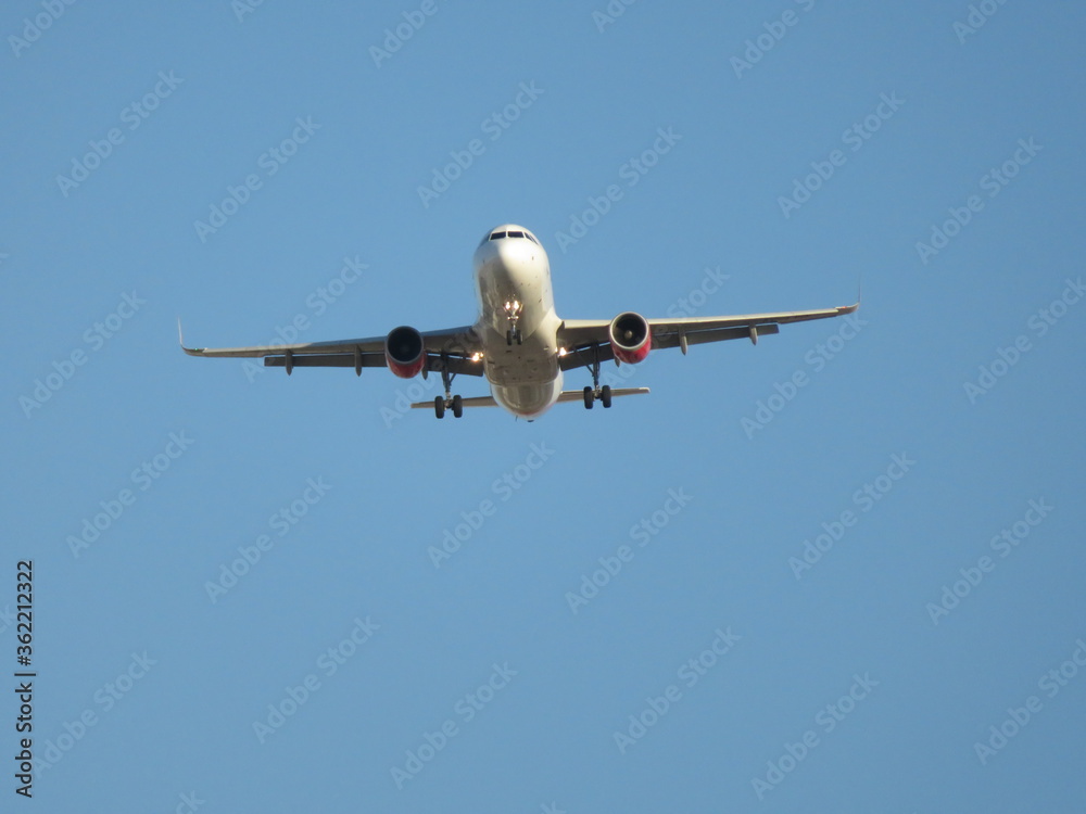 Beautiful photo of a plane landing at the airport taking land Beautiful photo of a plane landing at the airport taking land