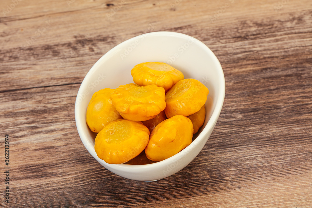 Marinated yellow patisson in the bowl Marinated yellow patisson in the bowl
