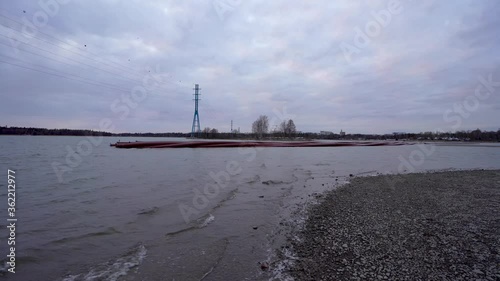 Many under water pipes waiting near Hietalahti beach for installation under water. Footage captured on cloudy evening.