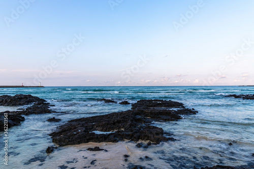 calm sea and clear sky and cloud landscape at jeju island korea 