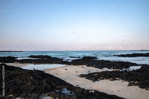 calm sea and clear sky and cloud landscape at jeju island korea 