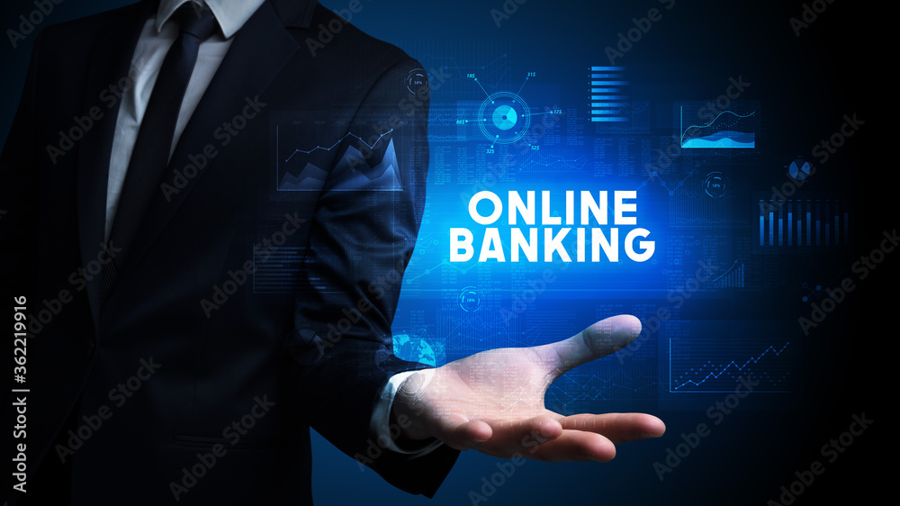 Hand of Businessman holding ONLINE BANKING inscription, business success concept Hand of Businessman holding ONLINE BANKING inscription, business success concept