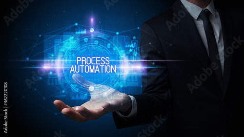 Wallpaper Mural Man hand holding PROCESS AUTOMATION inscription, technology concept Torontodigital.ca