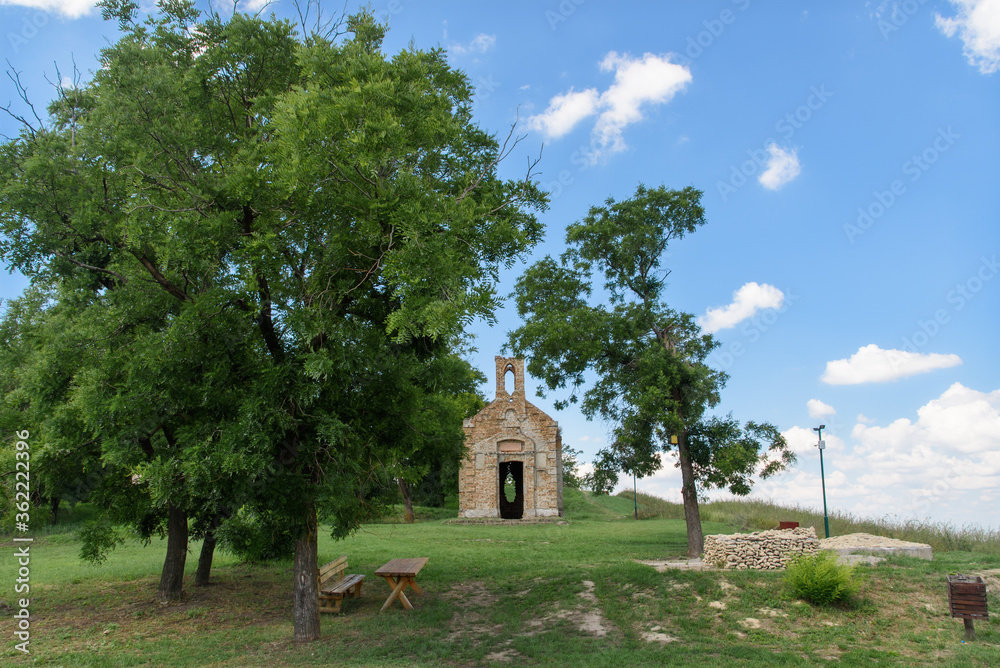 Titel, Serbia - June 25, 2020: Remains of old ruined monastery church on the hill above small town of Titel in Vojvodina, Serbia. Plateau of Titel Titel, Serbia - June 25, 2020: Remains of old ruined monastery church on the hill above small town of Titel in Vojvodina, Serbia. Plateau of Titel