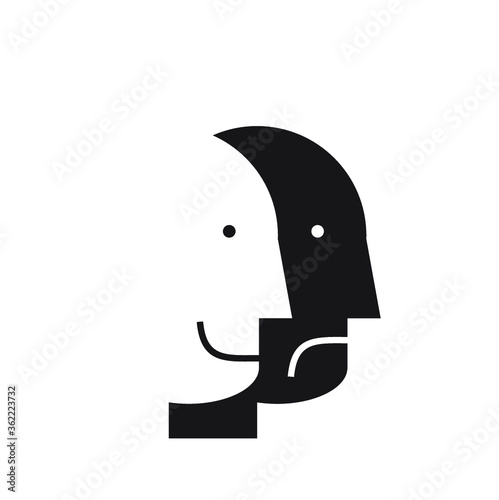 two faces: between sad and happy 