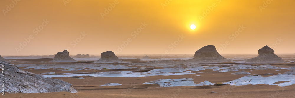 White Desert at Farafra in the Sahara of Egypt. Web banner in panoramic view.